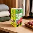 Pure Shield 16 cedar balls beside folded clothing